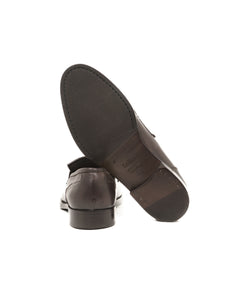 Grained dark brown moccasin, leather and dark brown rubber skat sole